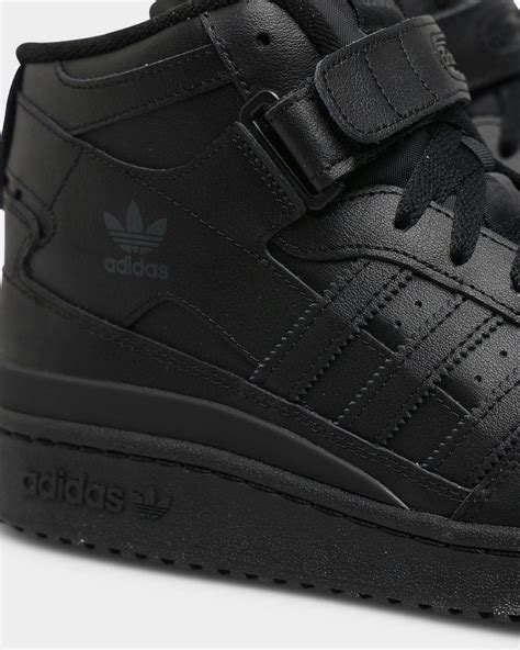 adidas black forum shoes.